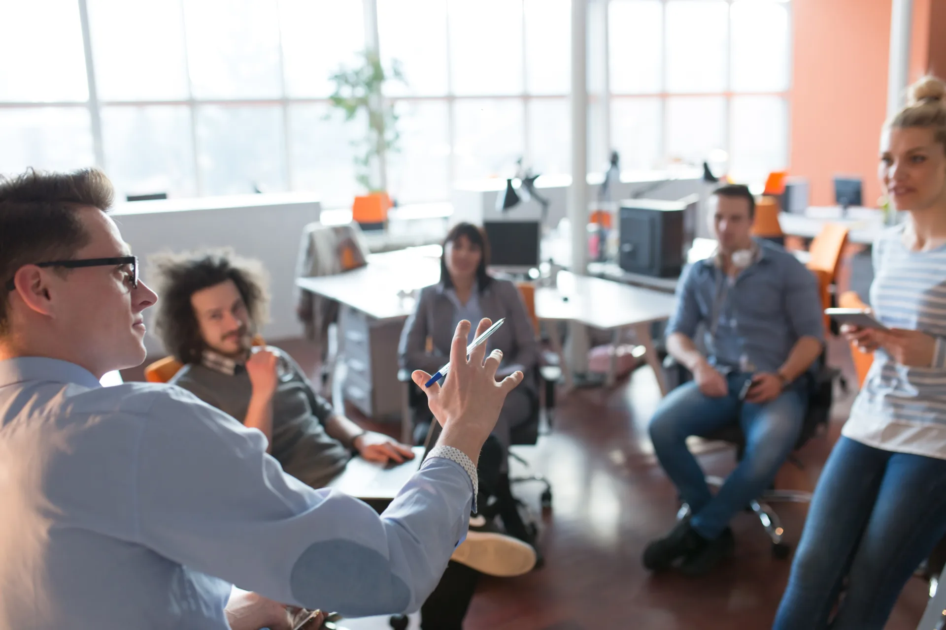 young business team at a meeting at modern office building