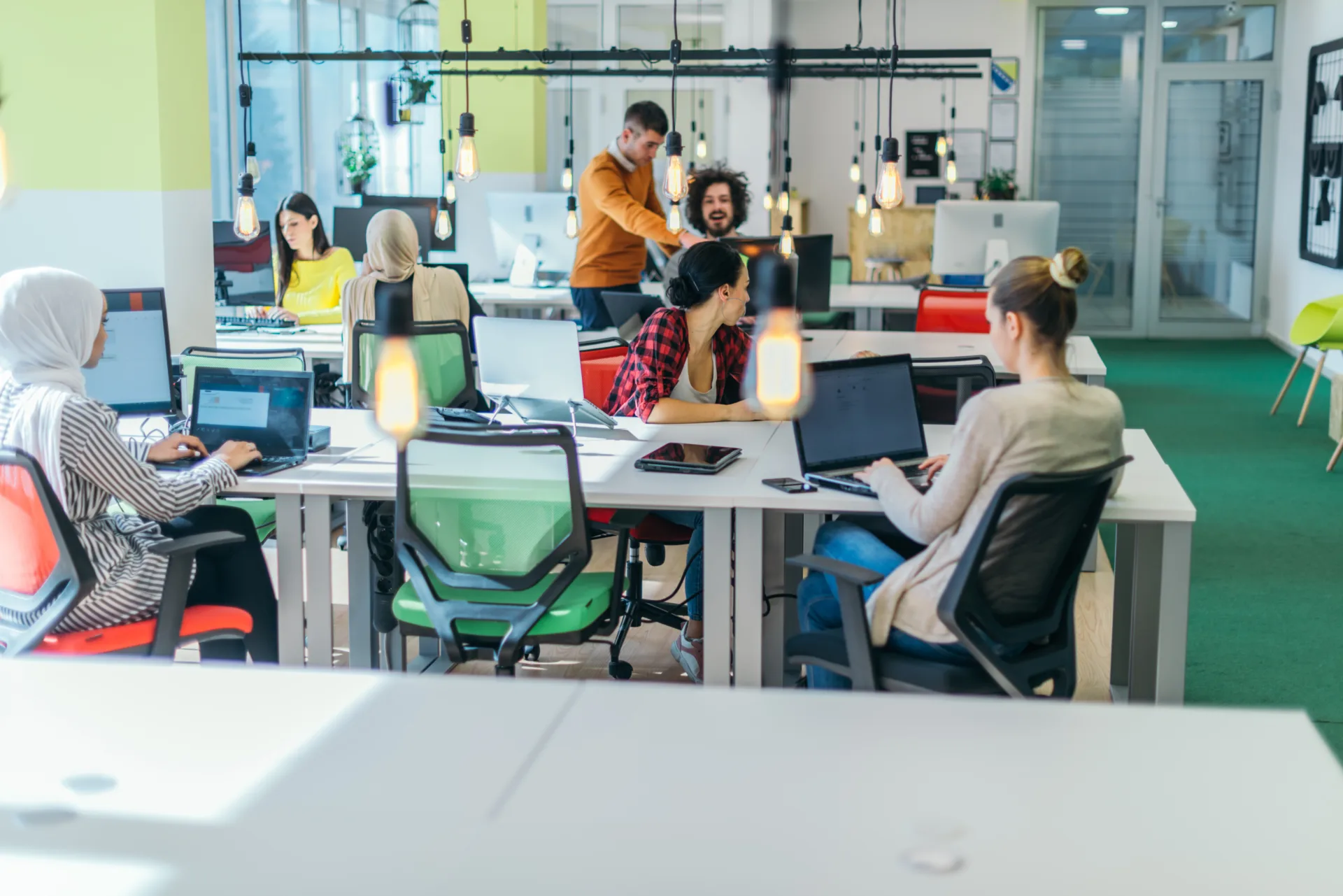 successful team. group of young business people working and comm