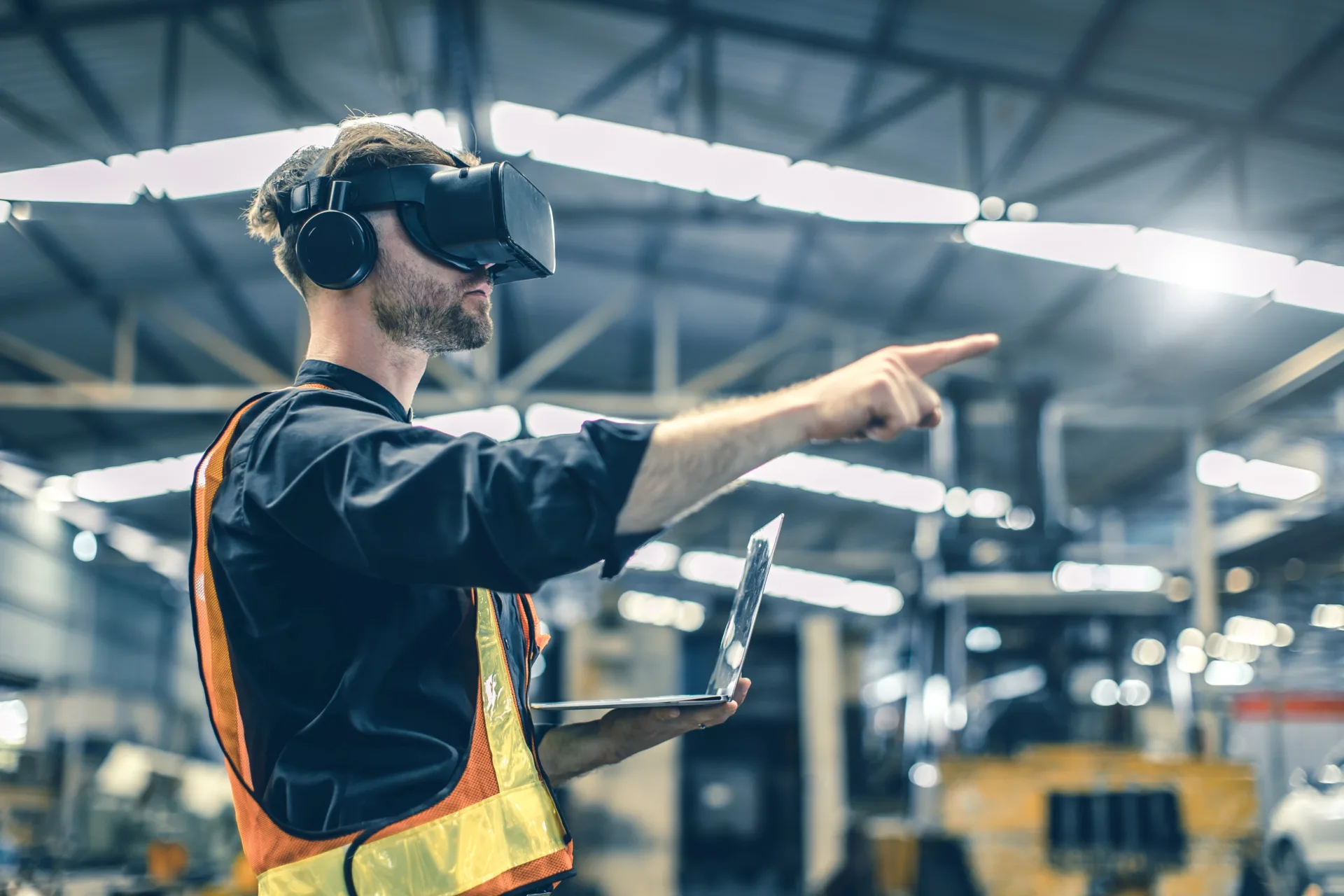 engineer male using vr virtual reality technology in modern warehouse factory new innovation engineering