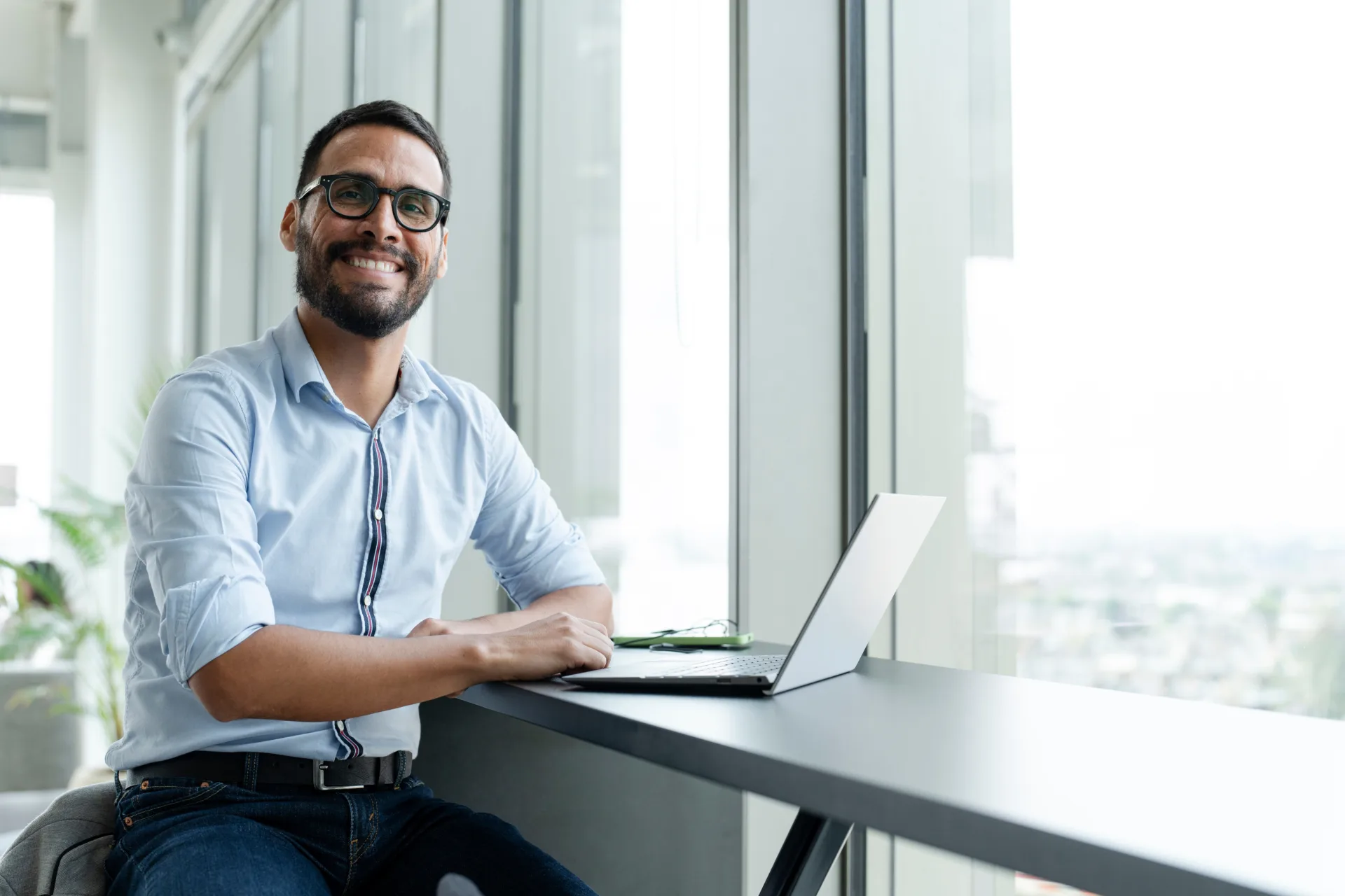 businessman with laptop working in modern office